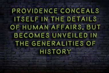 Zekice ve motive edici bir alıntı. Karanlıkta duvarda neon levhası