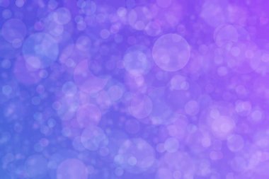 Çember şeklinde benekleri olan soyut bulanık açık mor arkaplan.