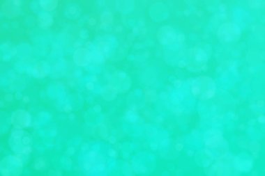 turkuaz soyut çözünmüş arkaplan daire şeklindeki bokeh noktalarıyla