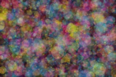 mavi, pembe ve sarı soyut çözünmüş arka plan daire şeklindeki bokeh noktalarıyla