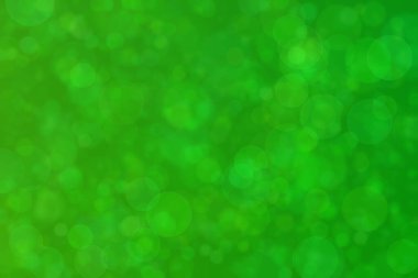 Çember şekilli bokeh benekli yeşil soyut odaklanmış arkaplan
