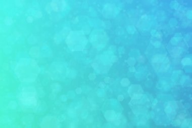 mavi ve yeşil soyut odaklanmamış arkaplan altıgen şekilli bokeh benekleri ile