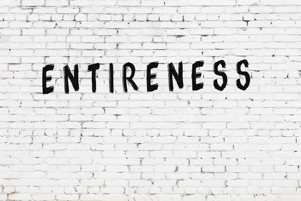 Yazma yorgunluğu beyaz tuğla duvara siyah boya ile yazılmış..