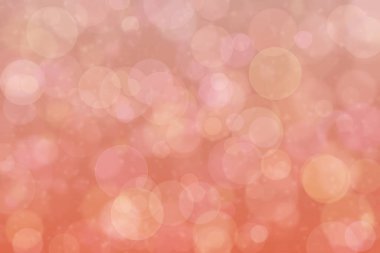 Çember şeklindeki bokeh noktalarıyla mercan soyutlanmış arkaplan