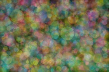 Bokeh ile soyut bir arkaplan. Yumuşak ışık odaklı noktalar.