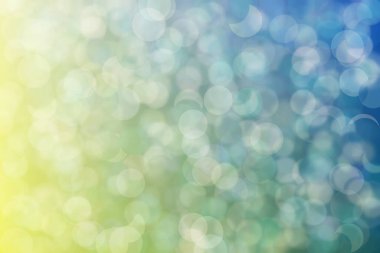 Bokeh ile soyut bir arkaplan. Yumuşak ışık odaklı noktalar.