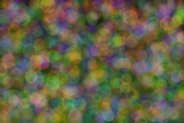 Bokeh ile soyut bir arkaplan. Yumuşak ışık odaklı noktalar.