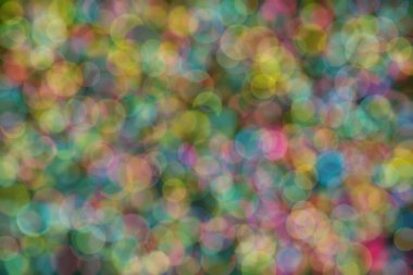 Bokeh ile soyut bir arkaplan. Yumuşak ışık odaklı noktalar.