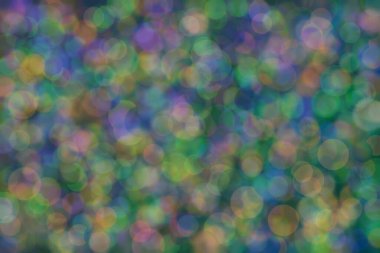 Bokeh ile soyut bir arkaplan. Yumuşak ışık odaklı noktalar.