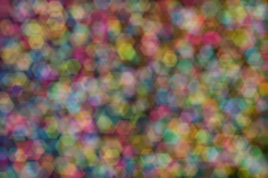 Bokeh ile soyut bir arkaplan. Yumuşak ışık odaklı noktalar.