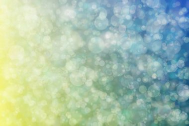 Bokeh ile soyut bir arkaplan. Yumuşak ışık odaklı noktalar.