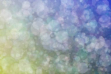 Harmonik renklere sahip güzel soyut bir arka plan. Yumuşak bokeh ışık noktaları.