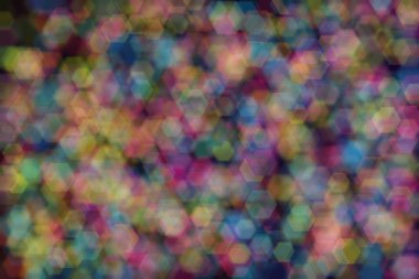 mavi, pembe ve sarı soyut çözünmüş arkaplan altıgen şekilli bokeh benekleri