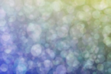 Harmonik renklere sahip güzel soyut bir arka plan. Yumuşak bokeh ışık noktaları.