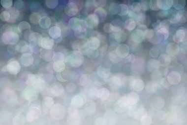 Harmonik renklere sahip güzel soyut bir arka plan. Yumuşak bokeh ışık noktaları.