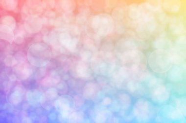 Pembe ve mavi soyutlanmış arka plan daire şeklindeki bokeh noktalarıyla