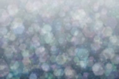 Harmonik renklere sahip güzel soyut bir arka plan. Yumuşak bokeh ışık noktaları.