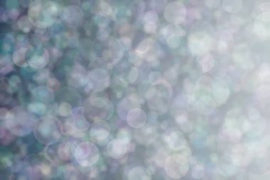 Harmonik renklere sahip güzel soyut bir arka plan. Yumuşak bokeh ışık noktaları.