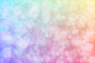 Pembe ve mavi soyutlanmış arka plan daire şeklindeki bokeh noktalarıyla