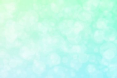 Bokeh ile soyut bir arkaplan. Yumuşak ışık odaklı noktalar.