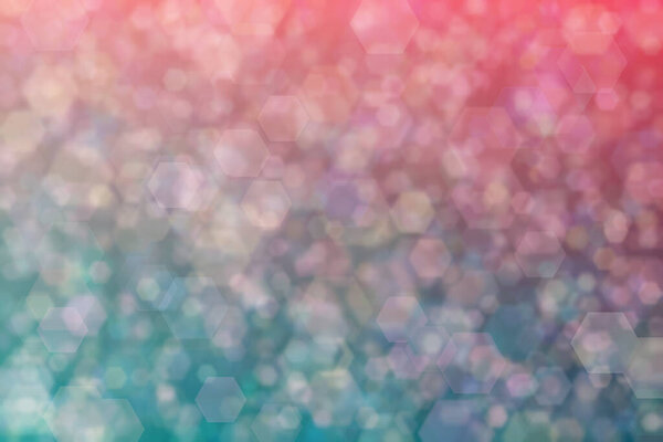 Beautiful harmonic mysterious backgeound with dark blue and green and pink colored bokeh.
