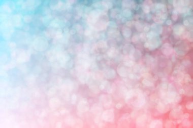 Pembe ve mavi soyutlanmış arka plan daire şeklindeki bokeh noktalarıyla