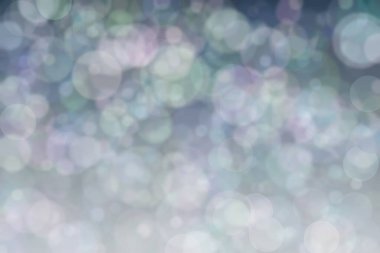 Bokeh ile soyut bir arkaplan. Yumuşak ışık odaklı noktalar.