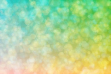 Cyan 'dan sarı renge gradyan üzerinde bokeh noktaları olan soyut arkaplan onların karışımı değil.