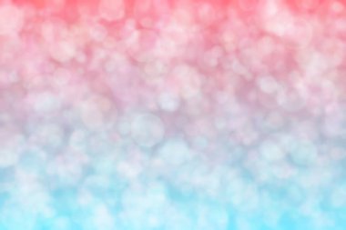 Pembe ve mavi soyutlanmış arka plan daire şeklindeki bokeh noktalarıyla