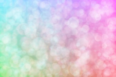 Pembe ve mavi soyutlanmış arka plan daire şeklindeki bokeh noktalarıyla