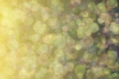 Bokeh ile soyut bir arkaplan. Yumuşak ışık odaklı noktalar.