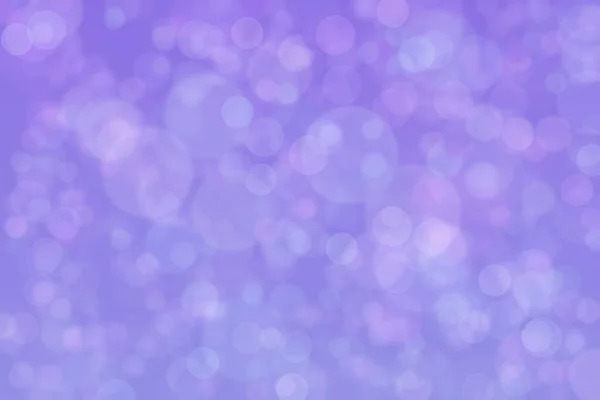 Abstract blurred light purple background with circle shaped spots.