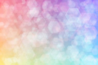 Altıgen şekilli bokeh noktalarıyla odaklanmış pembe ve mavi soyut arkaplan