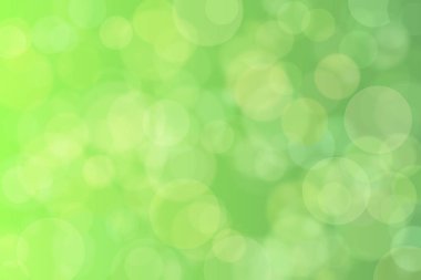 Çember şekilli bokeh benekli yeşil soyut odaklanmış arkaplan