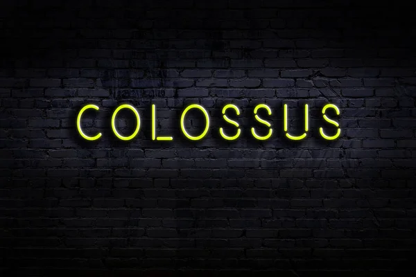 Neon Sign Inscription Colossus Brick Wall Night View — Φωτογραφία Αρχείου