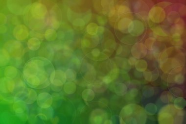 Çember şekilli bokeh benekli yeşil ve koyu soyut arkaplan