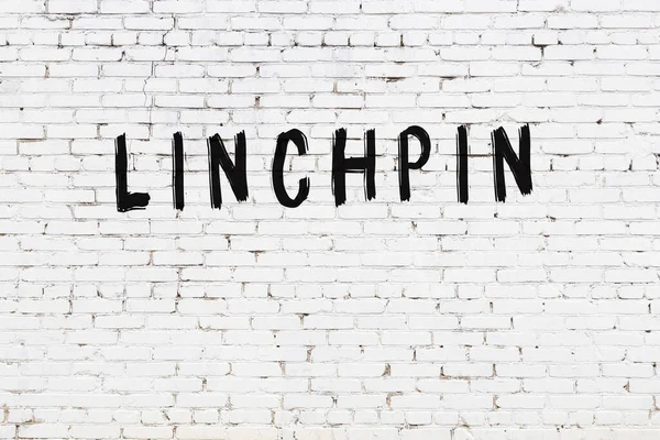 Inscription Linchpin Written Black Paint White Brick Wall — Stock Photo, Image