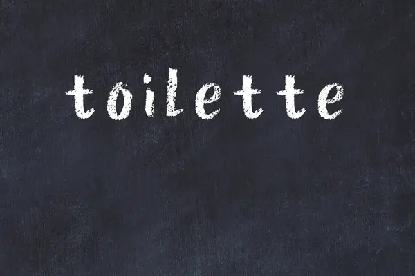 Üzerinde Yazısıyla Yazılmış Tuvaletler Olan Kolej Tahtası — Stok fotoğraf
