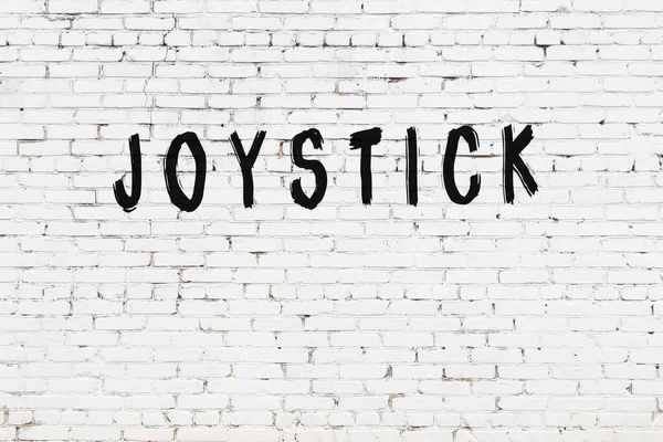 White Brick Wall Inscription Joystick Handwritten Black Paint — Stock Photo, Image