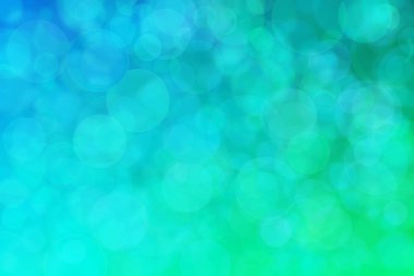 Çember şekilli bokeh benekli yeşil ve mavi soyutlanmış arkaplan