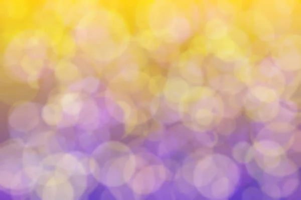 Abstract background with gradient from yellow to purple and different mixtures.