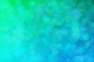 Yeşilden maviye ve altıgen şekilli beneklere geçiş yapan yeşil ve mavi soyut arkaplan.