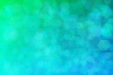 Yeşilden maviye ve altıgen şekilli beneklere geçiş yapan yeşil ve mavi soyut arkaplan.