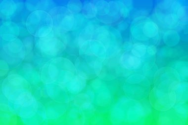 Yeşil ve mavi soyut arkaplan, yeşilden maviye ve daire şeklindeki beneklere geçiş.