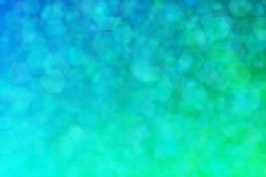 Altıgen şekilli bokeh noktalı yeşil ve mavi soyut odaklanmış arkaplan