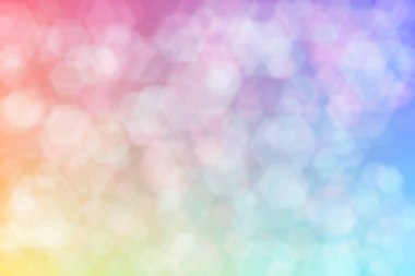 Altıgen şekilli bokeh noktalarıyla odaklanmış pembe ve mavi soyut arkaplan