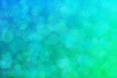 Yeşilden maviye ve altıgen şekilli beneklere geçiş yapan yeşil ve mavi soyut arkaplan.