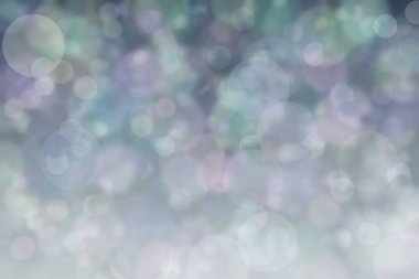 Daire şeklinde bokeh noktaları olan renkli bir arkaplan. Soyutlama