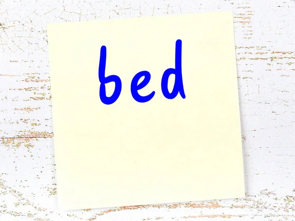 Concept Reminder Bed Yellow Sticky Sheet Paper Wooden Wall Inscription — Stock Photo, Image