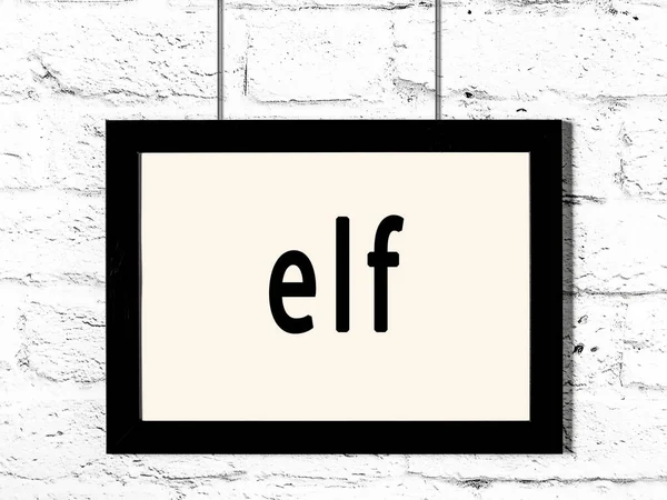 Zwart Houten Frame Met Inscriptie Elf Opknoping Witte Bakstenen Muur — Stockfoto